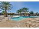 Inviting pool with ample lounge chairs at 42493 W Candyland Pl, Maricopa, AZ 85138