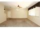 Bright living room featuring neutral walls and carpet at 4380 E Renee Dr, Phoenix, AZ 85050