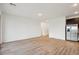 Bright, open-concept living room featuring tile floors and plenty of space at 46941 W Old Timer Rd, Maricopa, AZ 85139