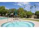 Relaxing community pool and spa with comfortable lounge chairs at 4800 N 68Th Street St # 279, Scottsdale, AZ 85251