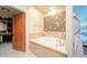 The bathroom has a soaking tub at 4909 N Woodmere Fairway -- # 2003, Scottsdale, AZ 85251
