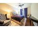 A comfortable bedroom has beautiful natural light at 4909 N Woodmere Fairway -- # 2003, Scottsdale, AZ 85251