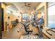 Well-equipped gym with free weights, exercise machines, and mirrored wall at 4909 N Woodmere Fairway -- # 2003, Scottsdale, AZ 85251