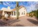 Landscaped backyard with a large saguaro cactus at 5965 E Teton Cir, Mesa, AZ 85215