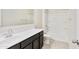 Bathroom features dark vanity, single sink, and shower/tub combo at 641 W Freedom St, Florence, AZ 85132