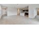 Open living room with tile floor and kitchen views at 641 W Freedom St, Florence, AZ 85132