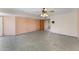 Bright bedroom featuring tile flooring and ceiling fan at 7319 E Rose Ln, Scottsdale, AZ 85250