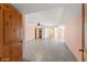 Spacious bedroom with tiled floors and ceiling fan at 7319 E Rose Ln, Scottsdale, AZ 85250