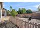 Backyard with wooden fence and small citrus tree at 741 W Cherrywood Dr, Chandler, AZ 85248