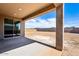 Backyard view of a blank lot with partial block fencing and mountain views at 7662 W Rowel Rd, Peoria, AZ 85383