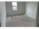 Unfurnished bedroom with window and closet at 7662 W Rowel Rd, Peoria, AZ 85383