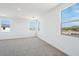 Large bonus room with several windows showing beautiful mountain views at 7662 W Rowel Rd, Peoria, AZ 85383