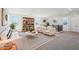 Cozy loft with comfortable seating, stylish decor, and ample natural light at 7662 W Rowel Rd, Peoria, AZ 85383