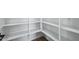 Bright walk-in pantry with ample shelving for organized storage at 7662 W Rowel Rd, Peoria, AZ 85383