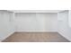 Spacious walk-in closet featuring carpeted floors and rod and shelf storage at 7662 W Rowel Rd, Peoria, AZ 85383