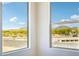 Windows offering views of the desert landscape at 7662 W Rowel Rd, Peoria, AZ 85383