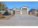 Two-story house with a two-car garage and landscaped front yard at 8026 W Wood Ln, Phoenix, AZ 85043