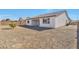 Spacious backyard with gravel and covered patio at 8026 W Wood Ln, Phoenix, AZ 85043