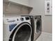 Modern laundry room with GE washer and LG dryer at 8026 W Wood Ln, Phoenix, AZ 85043