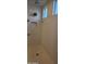 Spacious walk-in shower with tiled walls and multiple shower heads at 8026 W Wood Ln, Phoenix, AZ 85043