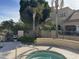 Community pool with well maintained landscaping and palm trees at 9065 E Gary Rd # 124, Scottsdale, AZ 85260