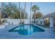 Refreshing blue pool surrounded by a concrete patio at 9790 E Caron St, Scottsdale, AZ 85258