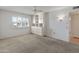 Bright bedroom with built-in shelving and window shutters at 9814 W Cedar Dr, Sun City, AZ 85351