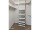 Large closet with shelving and hanging rods at 9814 W Cedar Dr, Sun City, AZ 85351