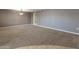 Spacious dining room with neutral walls and carpeting at 9814 W Cedar Dr, Sun City, AZ 85351