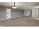 Dining room with view into kitchen and access to other rooms at 9814 W Cedar Dr, Sun City, AZ 85351