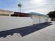 Attached garage with automatic door opener and exterior access at 10976 W Coggins Dr, Sun City, AZ 85351