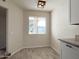 Kitchen nook with window and view of the outdoors at 10976 W Coggins Dr, Sun City, AZ 85351