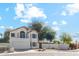 Two-story house with attached garage and landscaped yard at 11015 N 111Th Pl, Scottsdale, AZ 85259