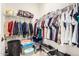 Large walk-in closet with ample storage shelving at 12058 N Loma Linda St, Surprise, AZ 85388