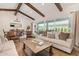 Spacious living room with vaulted ceilings, hardwood floors, and comfortable seating at 12058 N Loma Linda St, Surprise, AZ 85388