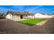 Artificial turf, covered patio, and gravel backyard at 1243 N Terripin --, Mesa, AZ 85207
