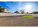 Artificial turf and gravel backyard with white fence at 1243 N Terripin --, Mesa, AZ 85207