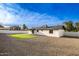 Artificial turf and gravel backyard with home exterior at 1243 N Terripin --, Mesa, AZ 85207