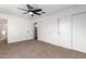 Bedroom with carpet, ceiling fan and ample closet space at 1243 N Terripin --, Mesa, AZ 85207