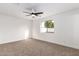 Simple bedroom with carpeted floor and ceiling fan at 1243 N Terripin --, Mesa, AZ 85207