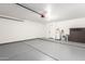 Spacious garage with epoxy floor and door to house at 1243 N Terripin --, Mesa, AZ 85207