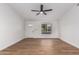 Bright and airy living room with large window and wood flooring at 1243 N Terripin --, Mesa, AZ 85207
