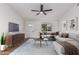 Modern living room with L-shaped sectional sofa and wood flooring at 1243 N Terripin --, Mesa, AZ 85207