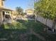 Spacious backyard featuring a patio and lawn at 12701 W Paradise Dr, El Mirage, AZ 85335