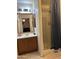 Clean bathroom with shower and wood vanity at 12701 W Paradise Dr, El Mirage, AZ 85335