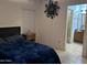 Spacious bedroom with ensuite bathroom access at 12701 W Paradise Dr, El Mirage, AZ 85335