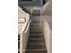 Modern staircase with wood flooring at 12701 W Paradise Dr, El Mirage, AZ 85335