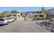 Inviting exterior of a two-story home with a paved driveway and landscaping at 12851 N Mimosa Dr # 102, Fountain Hills, AZ 85268