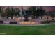 Beautiful Corte Bella fountain and community signage surrounded by lush landscaping and trees at 12953 W Figueroa Dr, Sun City West, AZ 85375