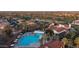 Aerial view of the resort-style pool, patio, and clubhouse amenities in Corte Bella at 12953 W Figueroa Dr, Sun City West, AZ 85375